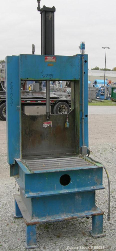 USED: Goodman hydraulic guillotine cutter, model 15. (1) 30" wide blade, single ram. Mounted on a frame with approximate 30" wide x 22" long roller conveyor infeed.Set up for maximum bale size of 30"...