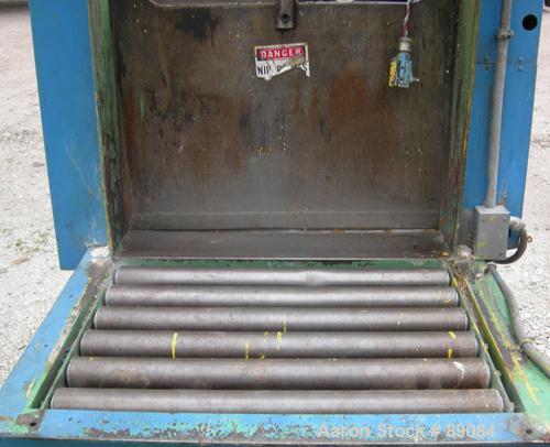 USED: Goodman hydraulic guillotine cutter, model 15. (1) 30" wide blade, single ram. Mounted on a frame with approximate 30" wide x 22" long roller conveyor infeed.Set up for maximum bale size of 30"...