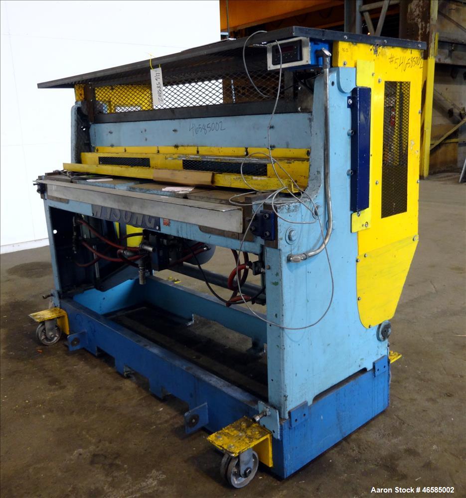 Used- Wysong 72" Wide In-Line Shear. Pneumatically operated. Includes controls. Mounted on carbon steel frame with casters.