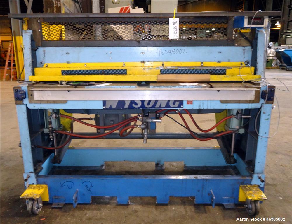 Used Wysong 72" Wide In-Line Shear. Pneumatically operated. Includes controls. Mounted on carbon steel frame with casters.