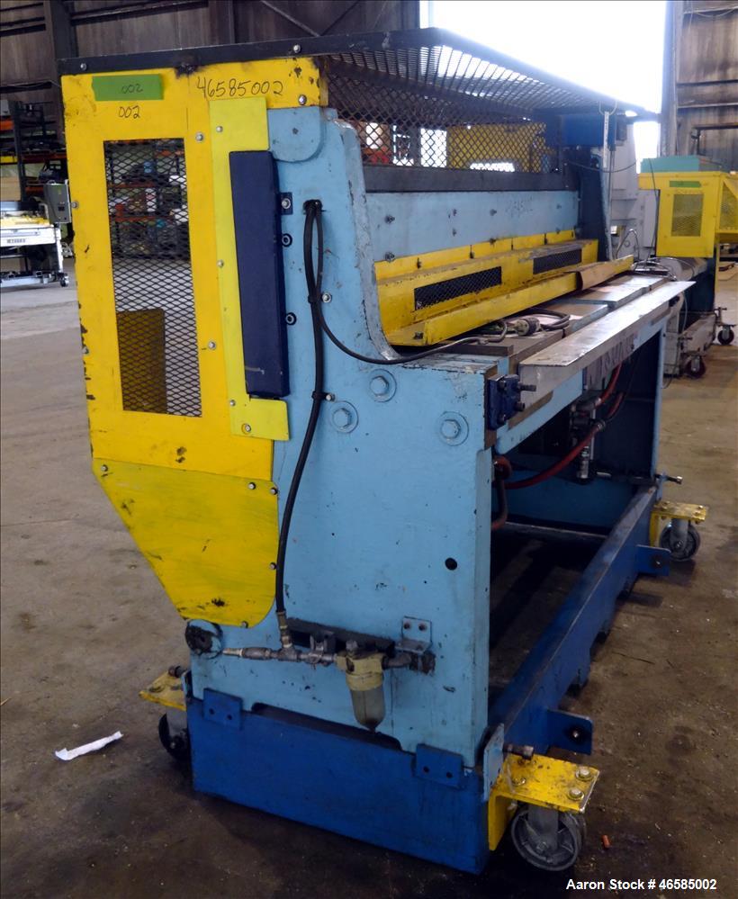 Used- Wysong 72" Wide In-Line Shear. Pneumatically operated. Includes controls. Mounted on carbon steel frame with casters.