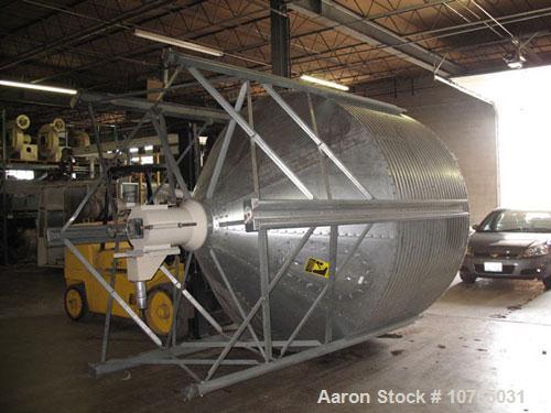 Used Approximate 10,000 lb Capacity Vertical Blender. 15 hp, 230/460 volt motor, 12" auger mixer, 3" OD vacuum take-off, side mounted box fill outlet with slide gate, clean out door. Mixer measures a...