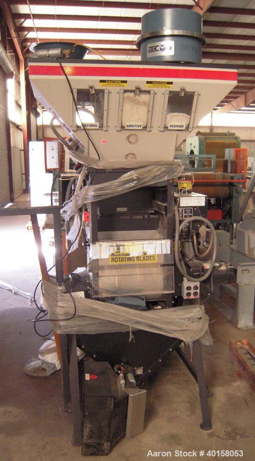 Used McGuire Loss And Weight 3 Component Blender. Has (2) primary component hoppers with third component being a color side feeder. Includes operator controls.