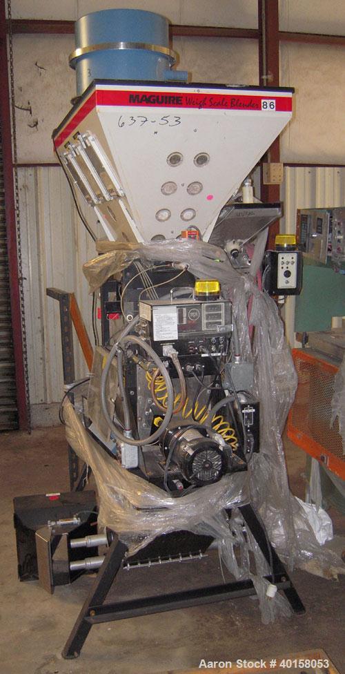 Used McGuire Loss And Weight 3 Component Blender. Has (2) primary component hoppers with third component being a color side feeder. Includes operator controls.