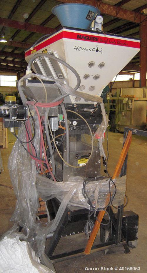 Used McGuire Loss And Weight 3 Component Blender. Has (2) primary component hoppers with third component being a color side feeder. Includes operator controls.