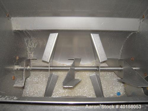 Used McGuire Loss And Weight 3 Component Blender. Has (2) primary component hoppers with third component being a color side feeder. Includes operator controls.