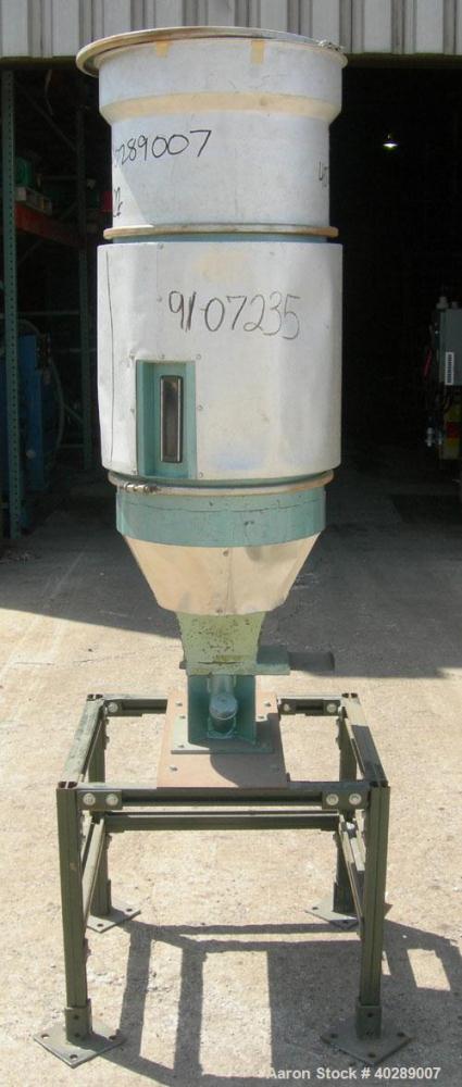 Used Insulated drying hopper, carbon steel. 18" diameter x 20" straight side x 15" top aluminum loading section with cover, coned bottom. Mounted on a stand.