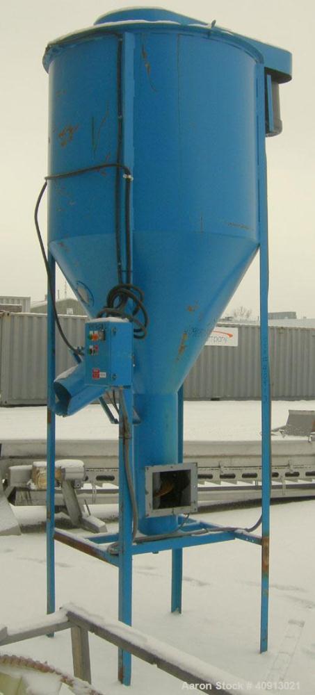 Used Vertical Screw Mixer, Approximate 35 cubic feet capacity, carbon steel. Approximately 44" diameter x 41" straight side x 36" coned bottom. 9" diameter vertical screw, driven by a 5 hp, 3/60/208-...