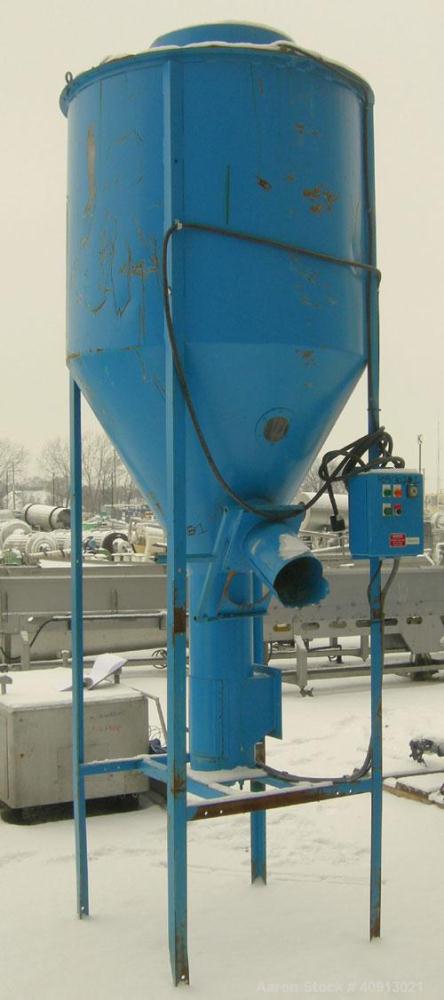 Used Vertical Screw Mixer, Approximate 35 cubic feet capacity, carbon steel. Approximately 44" diameter x 41" straight side x 36" coned bottom. 9" diameter vertical screw, driven by a 5 hp, 3/60/208-...
