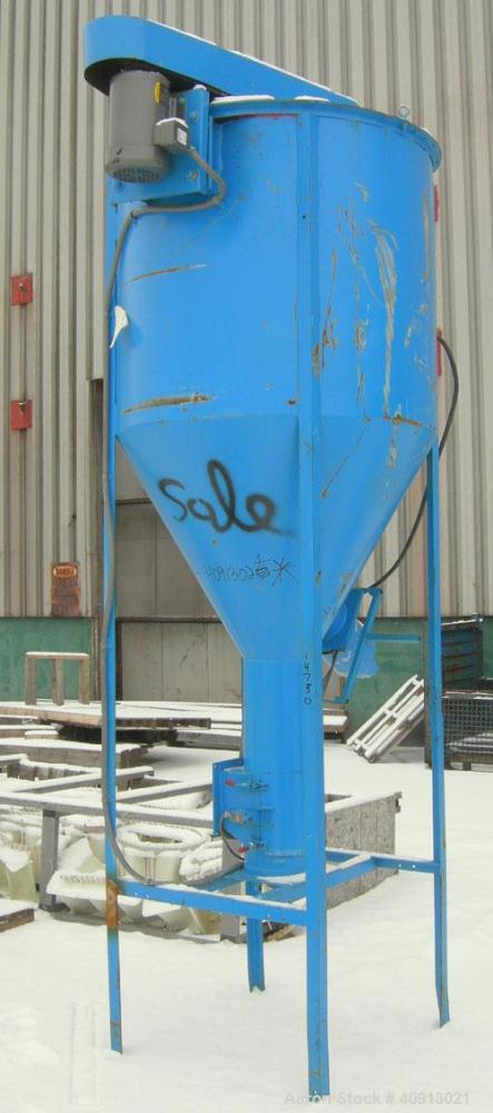 Used Vertical Screw Mixer, Approximate 35 cubic feet capacity, carbon steel. Approximately 44" diameter x 41" straight side x 36" coned bottom. 9" diameter vertical screw, driven by a 5 hp, 3/60/208-...