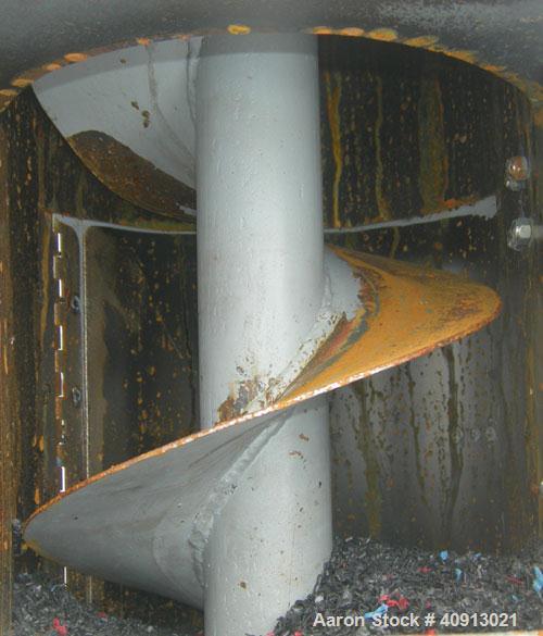 Used Vertical Screw Mixer, Approximate 35 cubic feet capacity, carbon steel. Approximately 44" diameter x 41" straight side x 36" coned bottom. 9" diameter vertical screw, driven by a 5 hp, 3/60/208-...