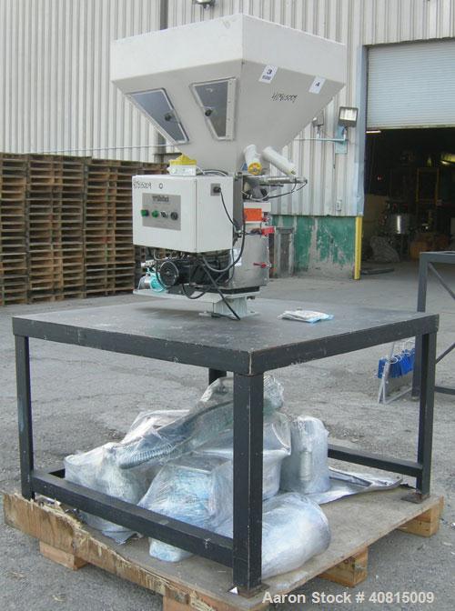 Used AEC Optimum OS Series Gravimetric Batch Blending System, Model OS-007-4, Carbon Steel.  (4) compartments.  Mounted on a carbon steel table.

