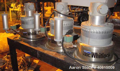 Used AEC Optimum OS Series Gravimetric Batch Blending System, Model OS-007-4, Carbon Steel.  (4) compartments.  Mounted on a carbon steel table.

