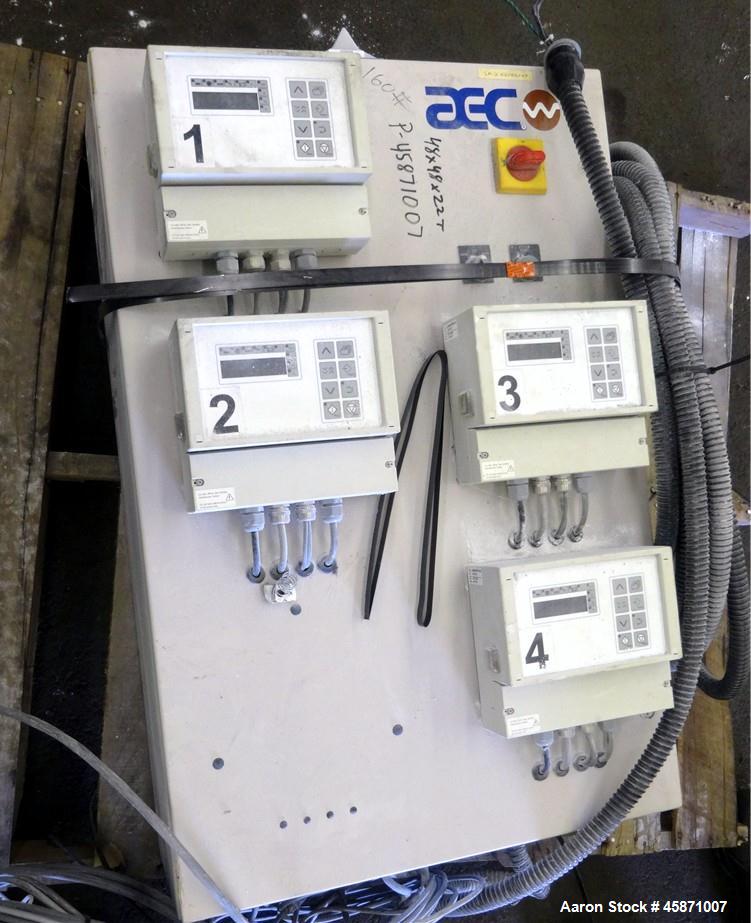 Used AEC (4) Component Colorblend Dosing Feeder, Model Synchrobln. (4) Rotating loading chambers, (1) main bottom hopper with a 6" bottom outlet. Includes a control panel with controllers. Mounted on...