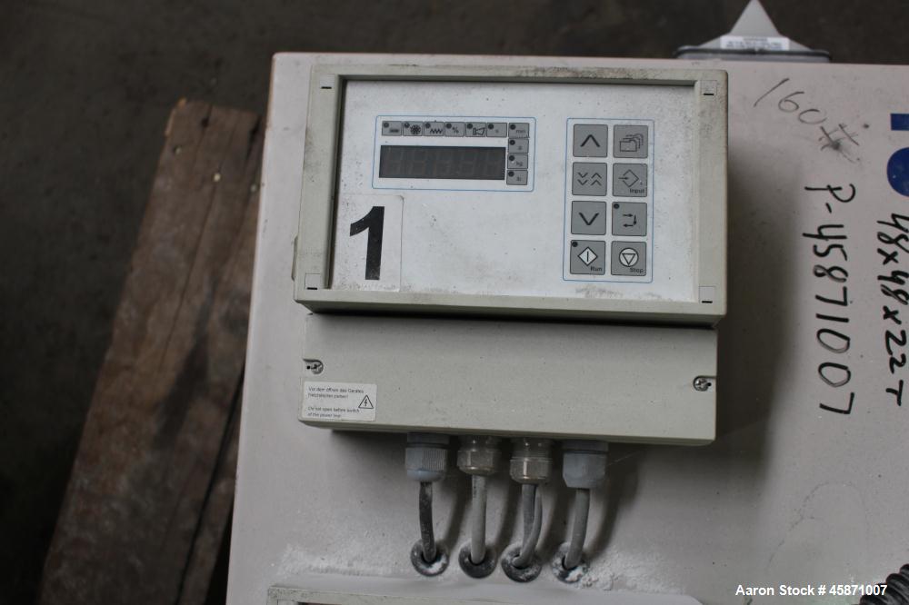 Used AEC (4) Component Colorblend Dosing Feeder, Model Synchrobln. (4) Rotating loading chambers, (1) main bottom hopper with a 6" bottom outlet. Includes a control panel with controllers. Mounted on...