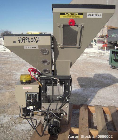 Used Conair/Maguire Products 4 Compartment Weigh Scale Gravimetric Blender, Model WSB-140R, Carbon Steel. Approximate 150 pounds an hour. Built 2003. 

