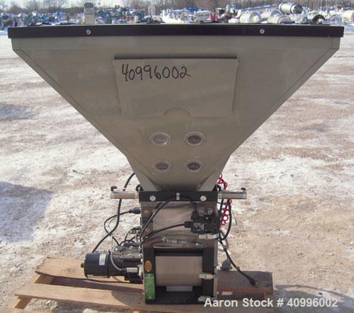 Used Conair/Maguire Products 4 Compartment Weigh Scale Gravimetric Blender, Model WSB-140R, Carbon Steel. Approximate 150 pounds an hour. Built 2003. 

