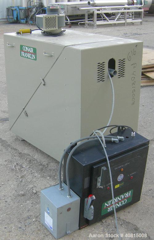 Used Conair 4 Color Blending System, Carbon Steel.  Each compartment has a top mounted vacuum loader.  Includes a Conair filter, 5 hp positive displacement blower, 1 stand, and a control panel.
