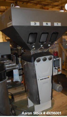 Used Doteco 6 Component Gravimetric Blending System, Model Grado, Type Q60, Serial #00004904. Includes (6) receivers, operator controls, previously installed on 5?, 250 hp 30/1 extruder. New 2010. Ra...
