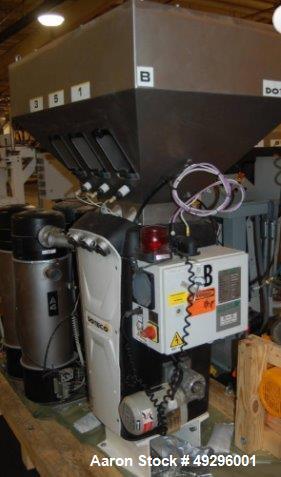 Used Doteco 6 Component Gravimetric Blending System, Model Grado, Type Q60, Serial #00004904. Includes (6) receivers, operator controls, previously installed on 5?, 250 hp 30/1 extruder. New 2010. Ra...