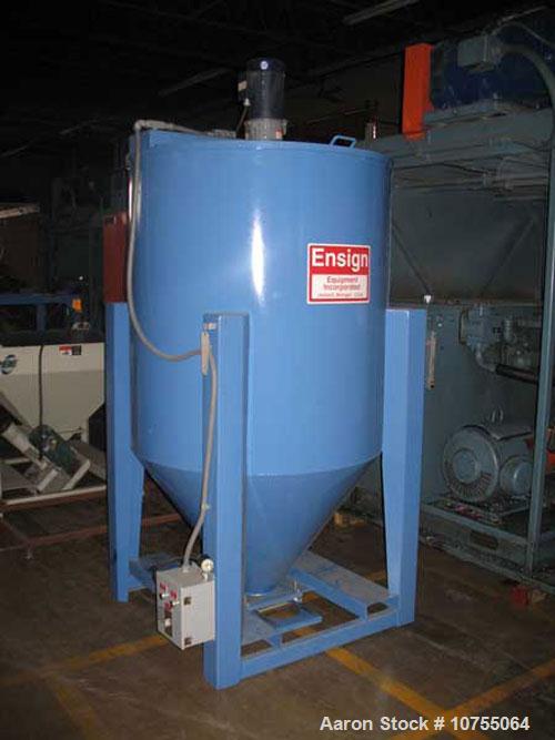 Used Ensign Equipment model 60-6200 vertical batch mixer, 60 cubis feet mixing capacity, 2000 lbs/hr approximate output, double hinged covers, 6" agitator auger, two way forklift channels, 30 minute ...