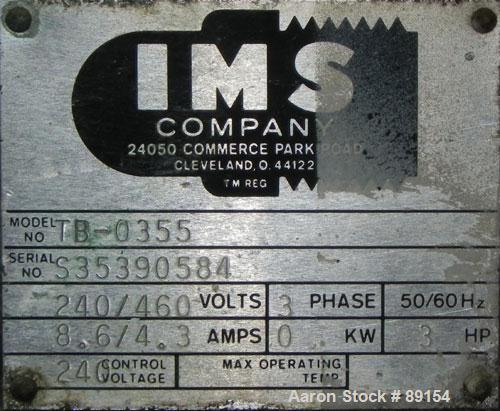 Used IMS Dual Drum Tumbler, Model TB-0355, Carbon Steel. Capacity (2) 55 gallon drums at 280 lbs per drum. Manually adjustable to accomodate 35 gallon drums. Driven by a 3 hp, 3/60/240/460 volt motor.