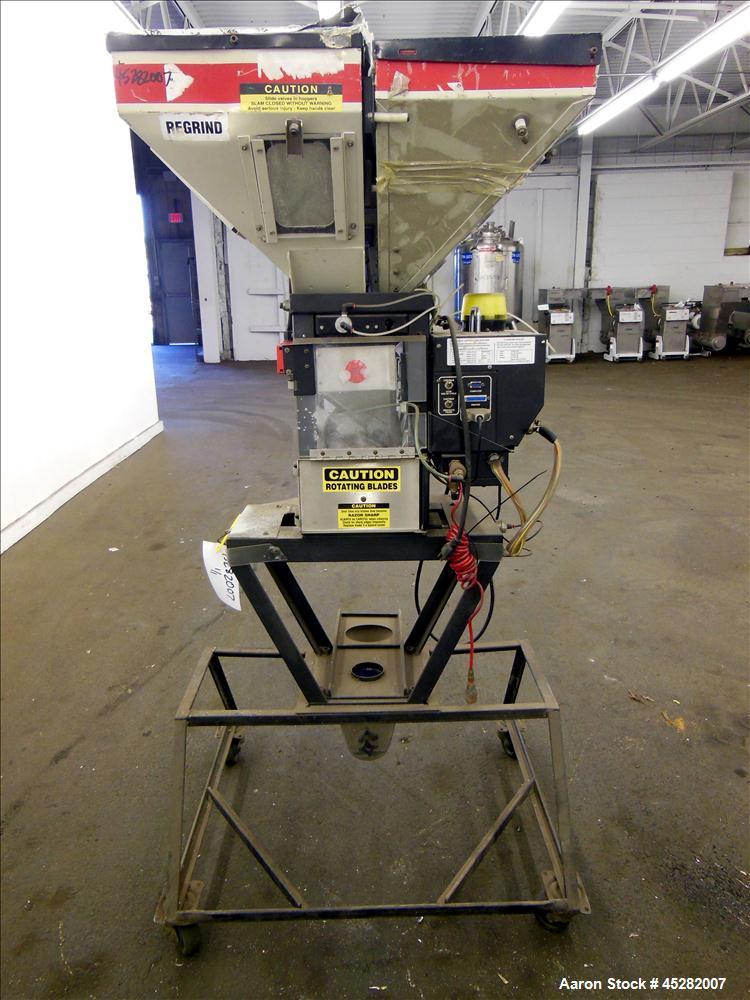 Used McGuire 4 Color Weigh Scale Blender, Model W-140RM1. Mounted on a stand with casters. Serial# 89574.
