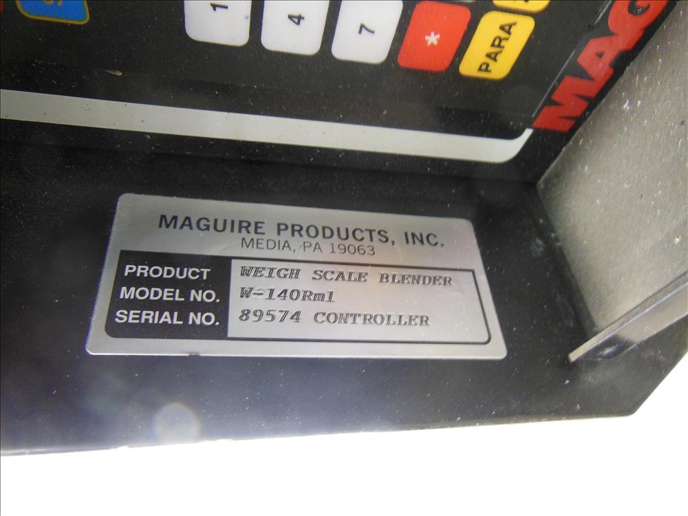 Used McGuire 4 Color Weigh Scale Blender, Model W-140RM1. Mounted on a stand with casters. Serial# 89574.