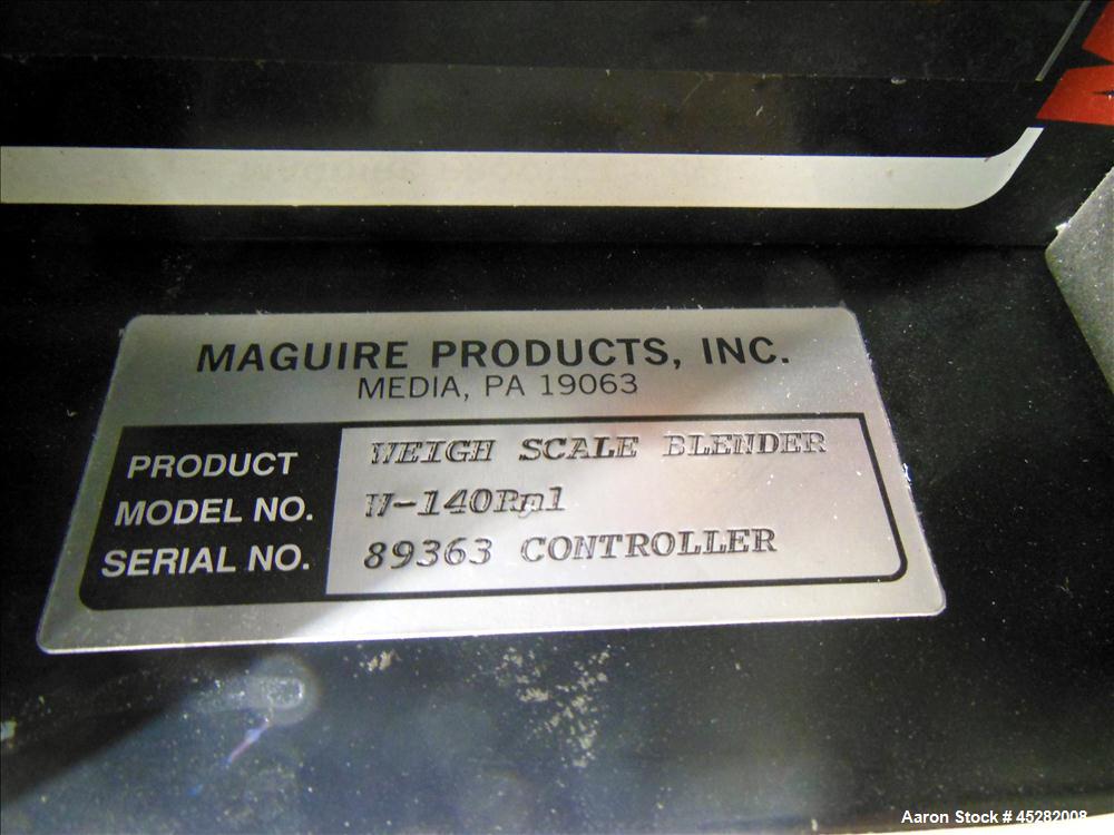Used McGuire 4 Color Weigh Scale Blender, Model W-140RM1. Mounted on a stand with casters. Serial# 89363.