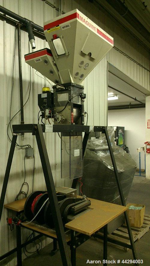 Used Maguire Products Weigh Scale Blender, Model WSB-221, Carbon Steel. Maximum throughput 400 KG an hour. Number of materials-3. Includes a Gaylord style stand. Built 1998.
