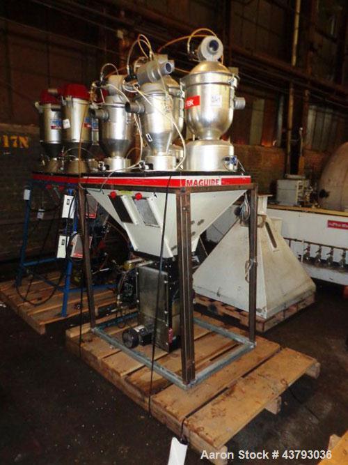 Used Maguire 4 material volumetric blender, model WSB 440T, rated up to 1450 lbs/hr, with Mould Tek pneumatic vacuum loaders, 1/6 HP 110 volt mixer motor, serial# 102135.14.
