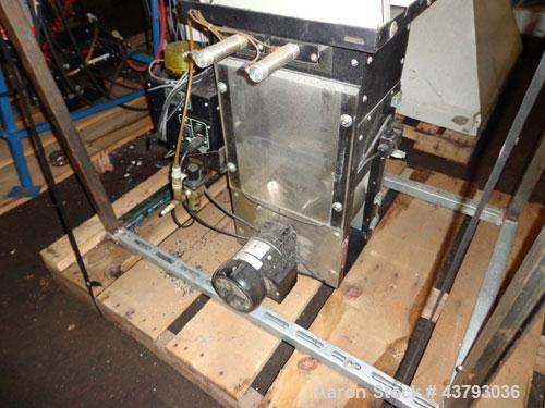 Used Maguire 4 material volumetric blender, model WSB 440T, rated up to 1450 lbs/hr, with Mould Tek pneumatic vacuum loaders, 1/6 HP 110 volt mixer motor, serial# 102135.14.