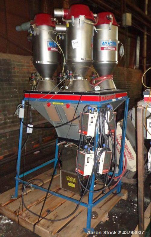 Used Maguire 4 material volumetric blender, model WSB 440T, rated up to 1450 lbs/hr, with Mould Tek pneumatic vacuum loaders, 1/6 HP 110 volt mixer motor, serial# 102135.14.