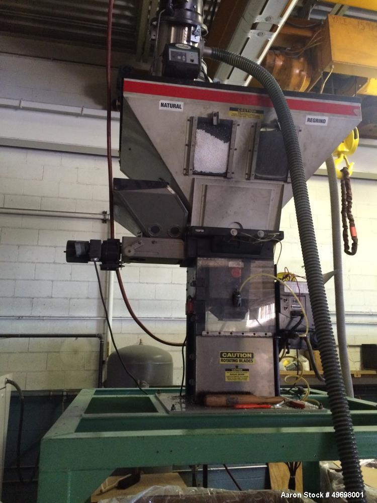 Used Maguire 4 Material Gravimetric Blender, Model WSB 440.  Rated up to 1400 lbs/hr.  4-2" x 3" Slide Gate.