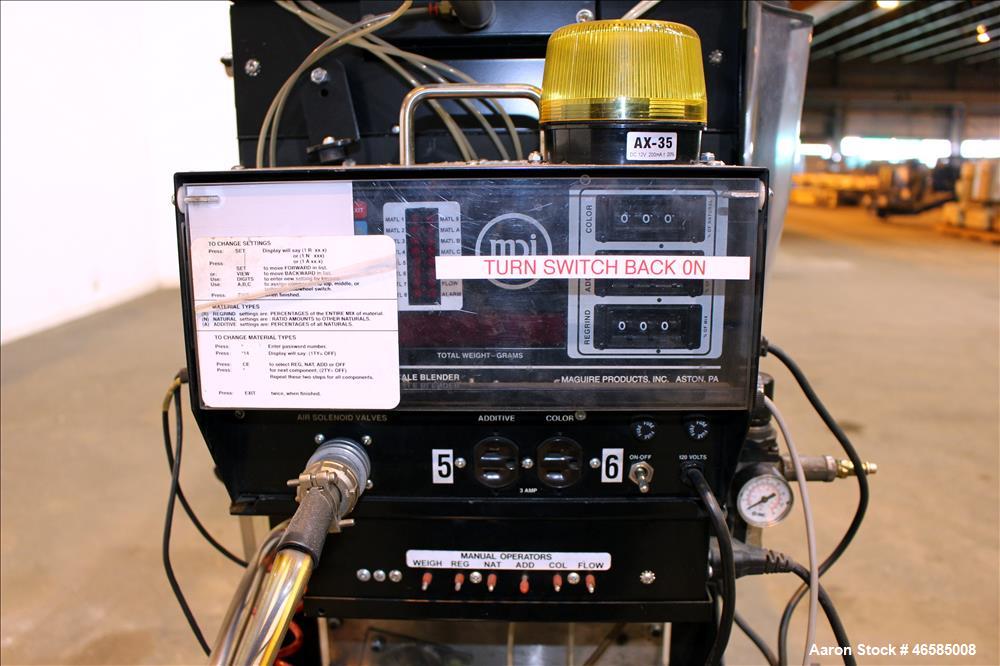 Used Maguire Weigh Scale Blender, Model WSB 940 Gravimetric Blender. Maximum throughput 2,645 lbs per hour to 3,200 lbs per hour. Includes hopper with 4 material compartments, Air operated slide gate...