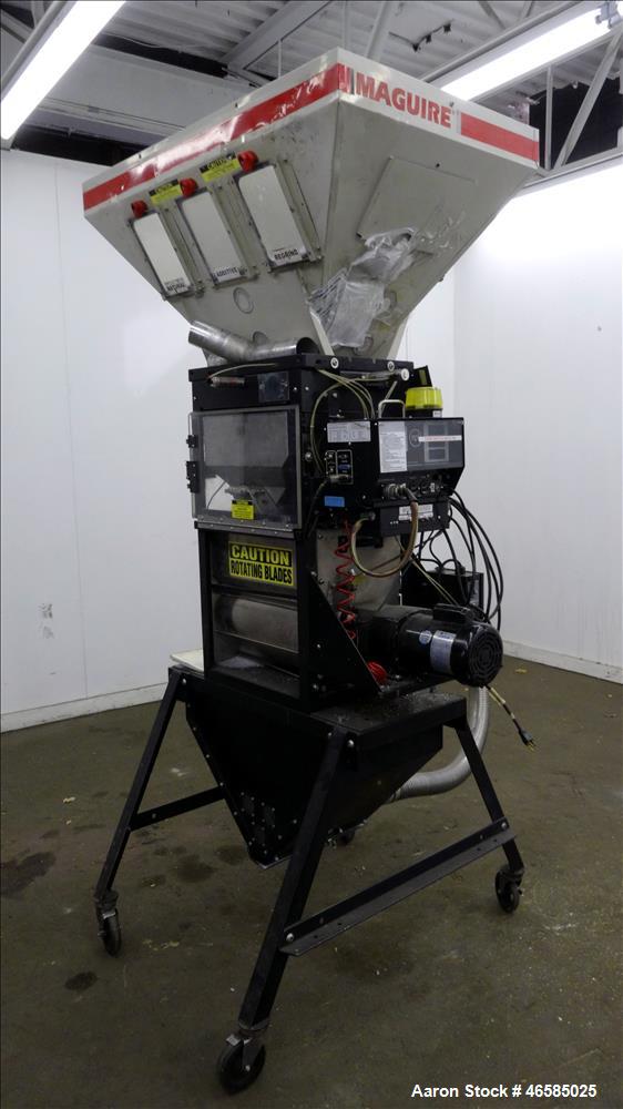 Used Maguire Weigh Scale Blender, Model WSB 940 Gravimetric Blender. Maximum throughput 2,645 lbs per hour to 3,200 lbs per hour. Includes hopper with 4 material compartments, Air operated slide gate...