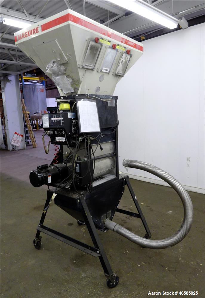 Used Maguire Weigh Scale Blender, Model WSB 940 Gravimetric Blender. Maximum throughput 2,645 lbs per hour to 3,200 lbs per hour. Includes hopper with 4 material compartments, Air operated slide gate...