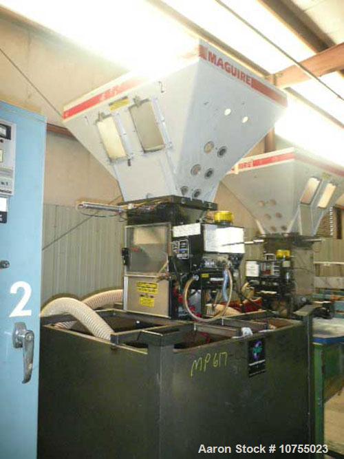 Used Maguire Model WSB240F 4 Component Blender. Up to 900 lbs/hour, 4 slide gates, hopper material level sensors, hopper site glasses, Gaylord gravity discharge into approximate 30 cubic foot materia...