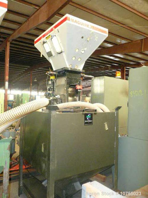 Used Maguire Model WSB240F 4 Component Blender. Up to 900 lbs/hour, 4 slide gates, hopper material level sensors, hopper site glasses, Gaylord gravity discharge into approximate 30 cubic foot materia...