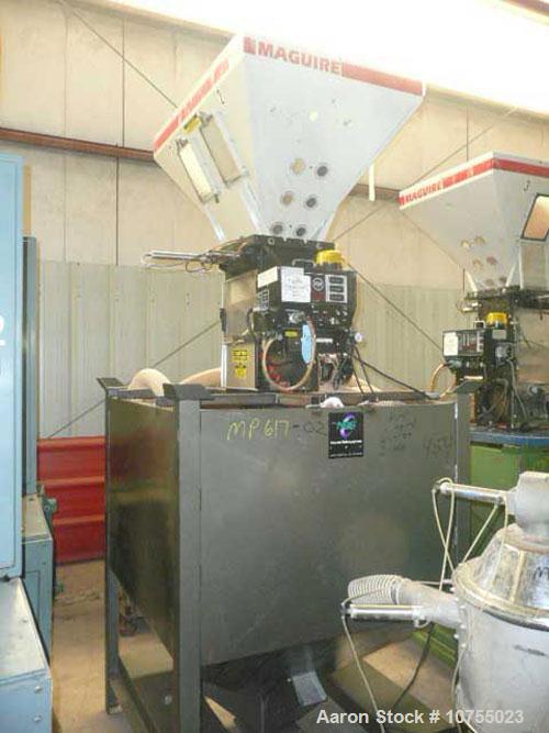 Used Maguire Model WSB240F 4 Component Blender. Up to 900 lbs/hour, 4 slide gates, hopper material level sensors, hopper site glasses, Gaylord gravity discharge into approximate 30 cubic foot materia...