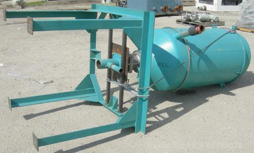 Used Drying Hopper, 304 stainless steel. 28" diameter x 54" straight side x 14" coned bottom. 2 1/2" side opening, approximate 8" center bottom outlet. Mounted on a carbon steel frame.
