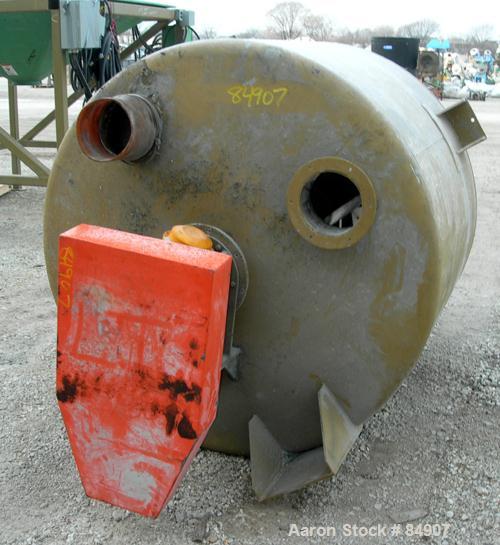 USED: Royal Vertical Screw Mixer, approximate 2000 liter capacity, carbon steel. Approximately 60" diameter x 44" straight side x 48" coned bottom. Approximate 6" diameter vertical screw, driven by a...