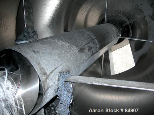 USED: Royal Vertical Screw Mixer, approximate 2000 liter capacity, carbon steel. Approximately 60" diameter x 44" straight side x 48" coned bottom. Approximate 6" diameter vertical screw, driven by a...
