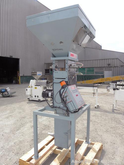 Used Thoresen McCosh Gravimetric Blender, Carbon Steel. (4) Color bins. Includes a Gravimetric contol panel and a blender, driven by a 1/2 hp, 1/60/115/230 volt, 1725 rpm gear motor, ratio 66 to 1. M...