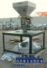 Used AEC Optimum OS Series Gravimetric Batch Blending System, Model OS-007-4, Carbon Steel.  (4) compartments.  Mounted on a carbon steel table.

