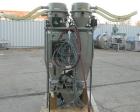 Used Conair 4 Color Blending System, Carbon Steel.  Each compartment has a top mounted vacuum loader.  Includes a Conair filter, 5 hp positive displacement blower, 1 stand, and a control panel.