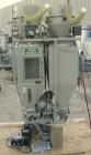 Used Conair 4 Color Blending System, Carbon Steel.  Each compartment has a top mounted vacuum loader.  Includes a Conair filter, 5 hp positive displacement blower, 1 stand, and a control panel.