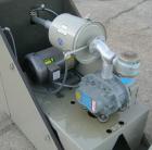 Used Conair 4 Color Blending System, Carbon Steel.  Each compartment has a top mounted vacuum loader.  Includes a Conair filter, 5 hp positive displacement blower, 1 stand, and a control panel.