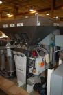 Used Doteco 6 Component Gravimetric Blending System, Model Grado, Type J60, Serial #24SN4903. Includes (6) receivers, operator controls, previously installed on 2.5″, extruder. New 2010. Blending sys...