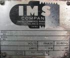 Used IMS Dual Drum Tumbler, Model TB-0355, Carbon Steel. Capacity (2) 55 gallon drums at 280 lbs per drum. Manually adjustable to accomodate 35 gallon drums. Driven by a 3 hp, 3/60/240/460 volt motor.